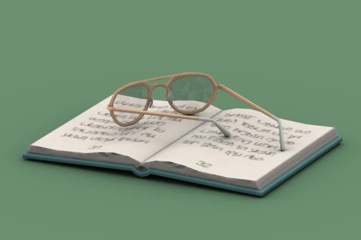QICC - Evergreen Book with Glasses