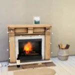 Fireplace with string lights and log tree basket